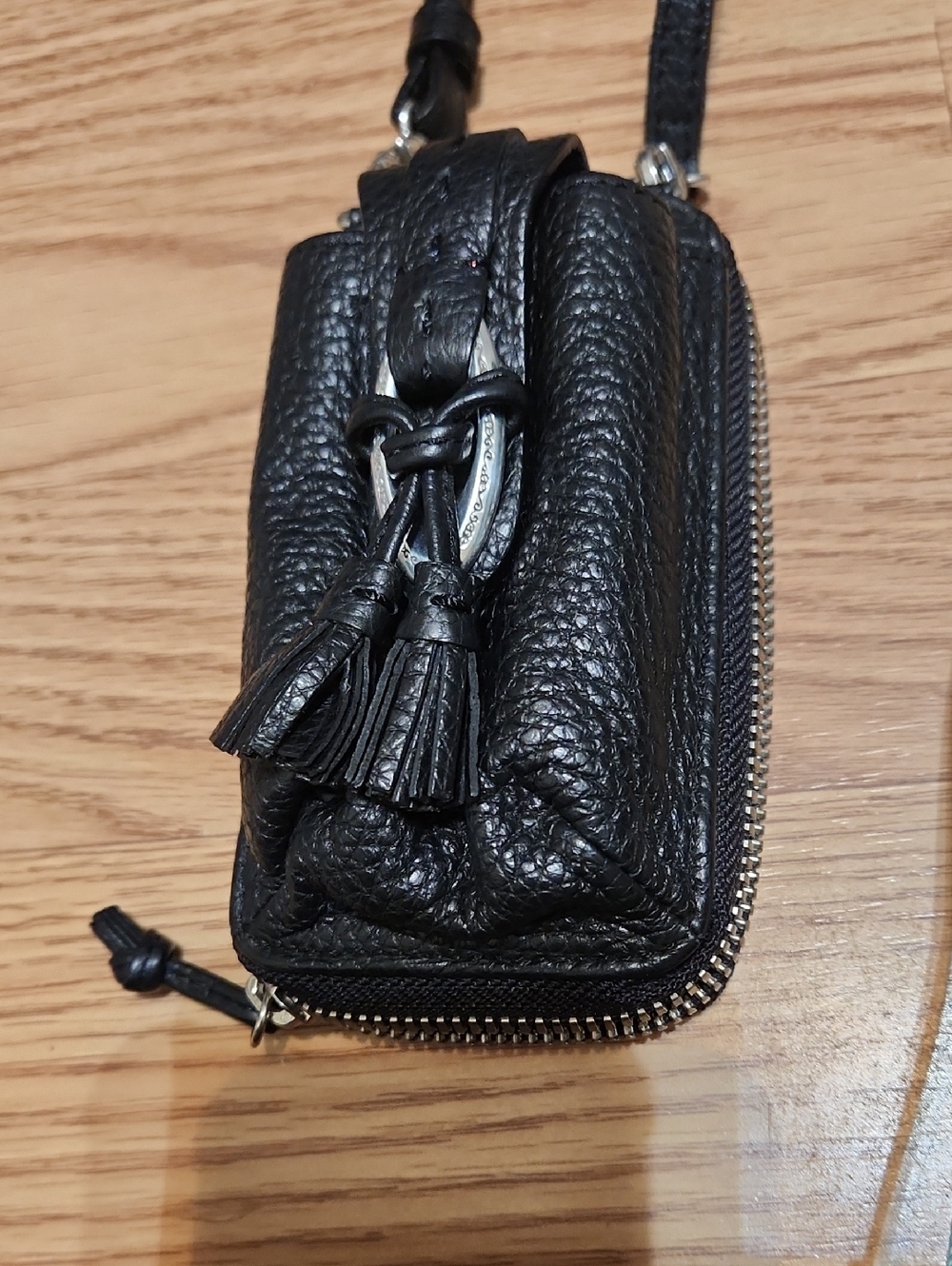 Brighton Compact Black Pebbled Leather Mini Crossbody with Tassel Detail